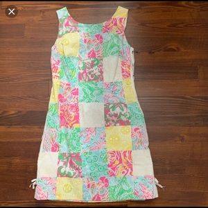 Patchwork shift dress with lace up sides